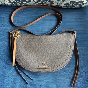 Michael Kors brown leather cross body bag.